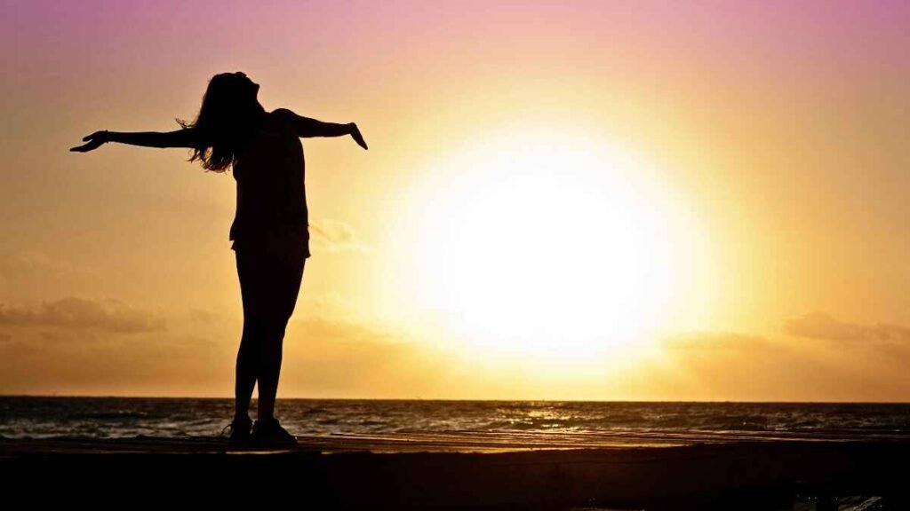 Person feeling happy and relieved after becoming debt free