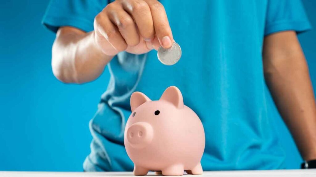 Saving small amounts of money in a jar representing the debt snowball method