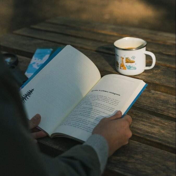 person reading book in morning
millionaire morning habit 2026
